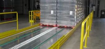 Sistema di carico con rulli e catene per pallet Slipchain